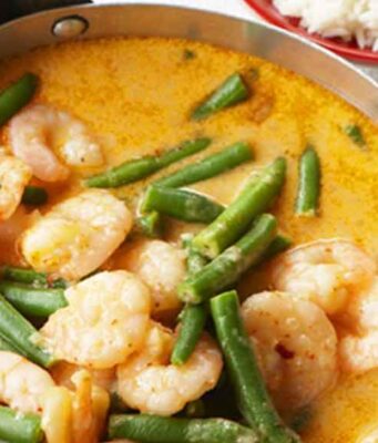 5 Best Places To Eat Seafood Near Thane Prawns in Indian yellow gravy and rice