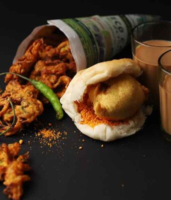 5 Delicious Things To Eat In Mumbai During Monsoons: A Food Lover’s Guide mumbai bhajiya vada pav and cutting chai