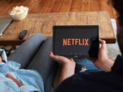 5 Must Watch Indie Flicks on Netflix couple watching netflix on an ipad