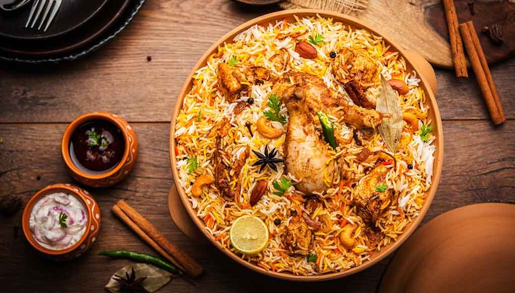 5 Traditional Dishes You Have to Try: Discover the Rich Flavors of India Biryani rice table top